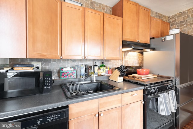 kitchen with sink, decorative backsplash, and black appliances