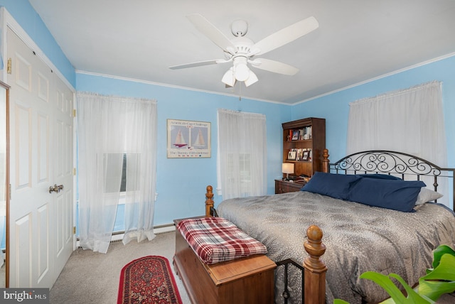 bedroom with ornamental molding, light colored carpet, and ceiling fan