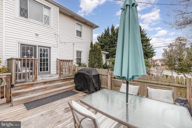 wooden deck featuring grilling area