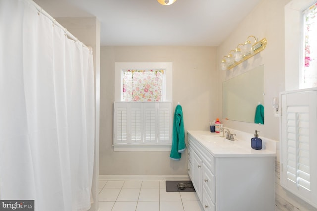 bathroom with vanity and tile patterned flooring