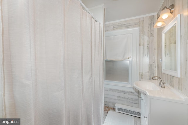 bathroom with vanity and crown molding