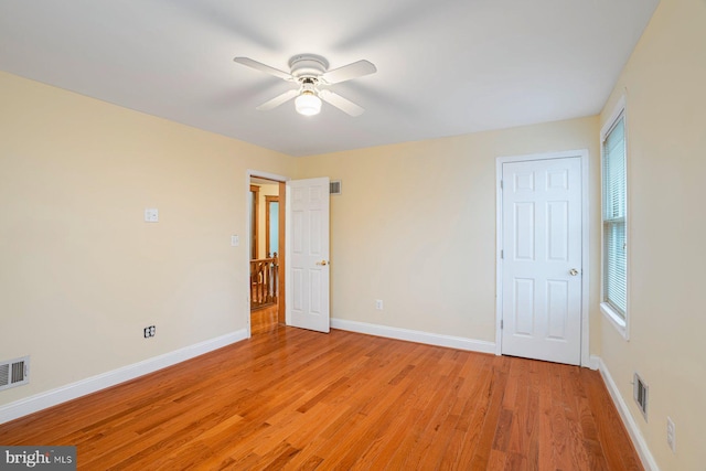 unfurnished bedroom featuring ceiling fan and light wood-type flooring