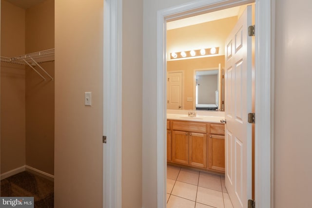 bathroom featuring tile patterned floors and vanity