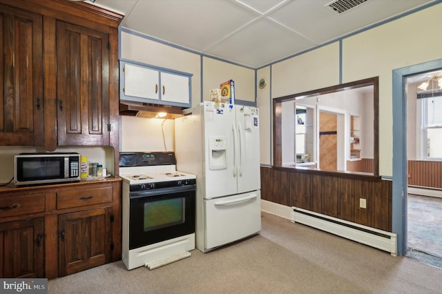 kitchen featuring light carpet, range hood, a baseboard radiator, and white appliances