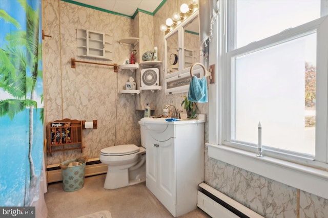 bathroom with vanity, toilet, and a baseboard radiator