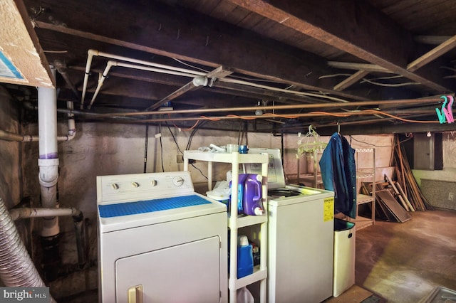 washroom with washer and dryer