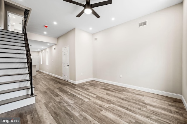 2442 Nicholas St, Philadelphia, PA 19121 - unfurnished living room featuring wood finished floors, recessed lighting, stairway, a ceiling fan, and baseboards