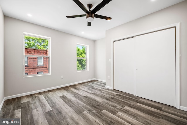 2442 Nicholas St, Philadelphia, PA 19121 - unfurnished bedroom with multiple windows, recessed lighting, and wood finished floors