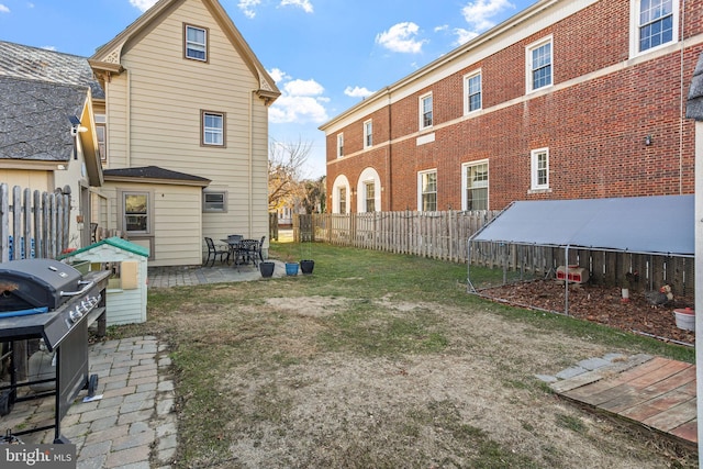 back of house with a patio area