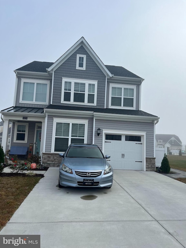 view of front of property featuring a garage