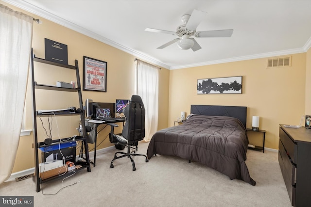 bedroom with ceiling fan, light carpet, and crown molding