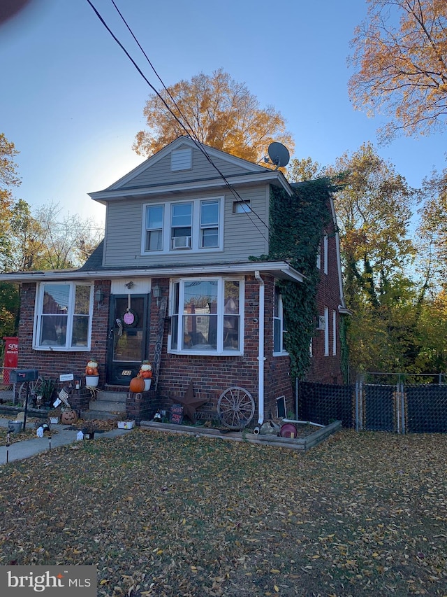 view of front of home with a front yard