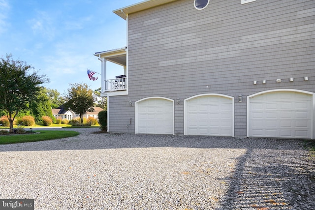 11209 Woodside Dr, Berlin, MD 21811 - view of side of property with a garage and gravel driveway