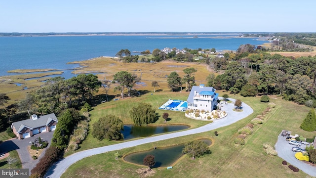 bird's eye view with a water view