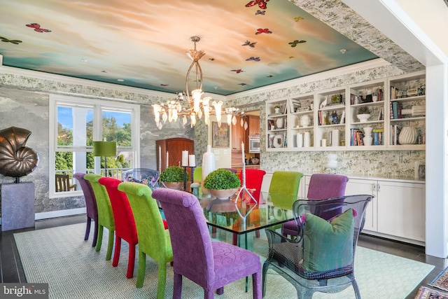 11209 Woodside Dr, Berlin, MD 21811 - dining room featuring a notable chandelier, wainscoting, and wallpapered walls