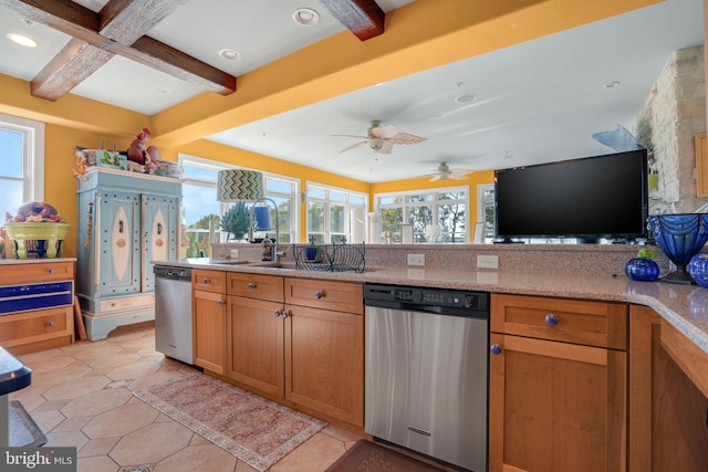 kitchen with light stone countertops, beamed ceiling, stainless steel dishwasher, and light tile patterned floors