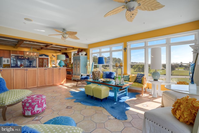 sunroom / solarium with ceiling fan with notable chandelier