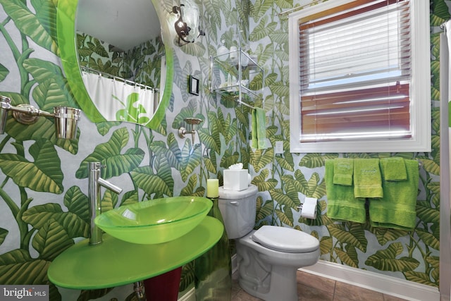 11209 Woodside Dr, Berlin, MD 21811 - full bathroom with curtained shower, tile patterned flooring, toilet, and wallpapered walls