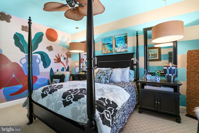 bedroom featuring ceiling fan and light colored carpet