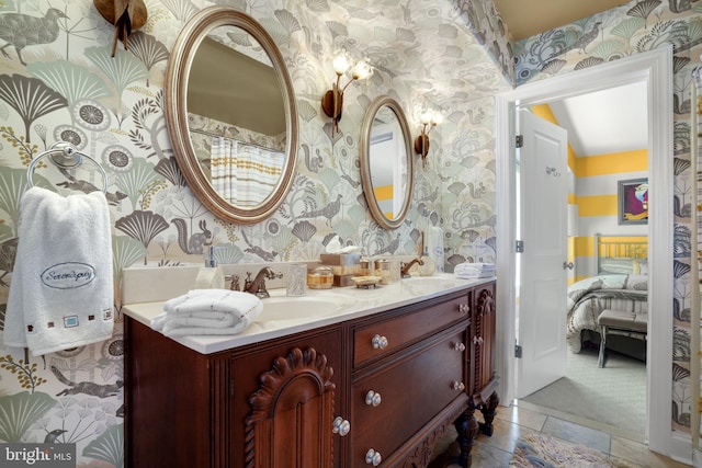 11209 Woodside Dr, Berlin, MD 21811 - ensuite bathroom featuring ensuite bath, wallpapered walls, a sink, and double vanity