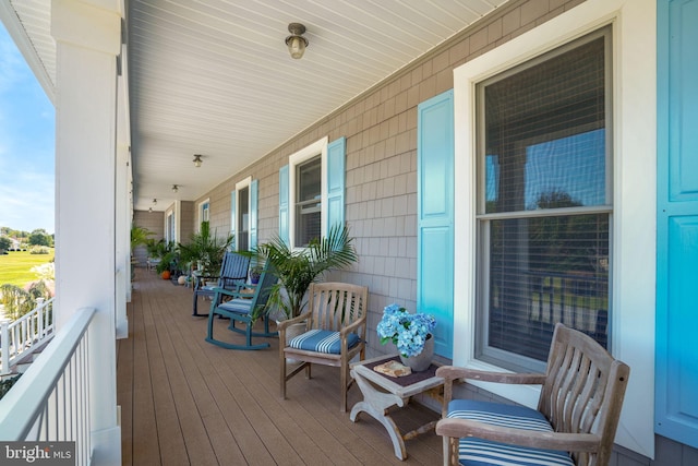 11209 Woodside Dr, Berlin, MD 21811 - wooden terrace with a porch