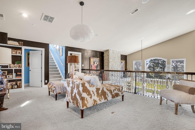 living room with light carpet and vaulted ceiling