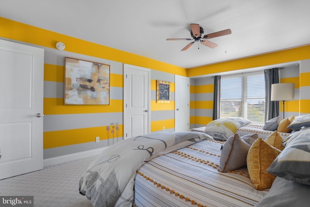 bedroom with ceiling fan and light colored carpet