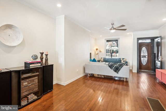 bedroom featuring wood-type flooring and crown molding