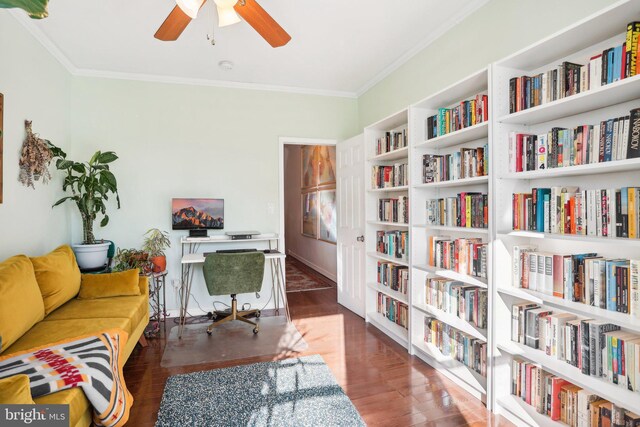 office area with crown molding, ceiling fan, and dark wood-type flooring