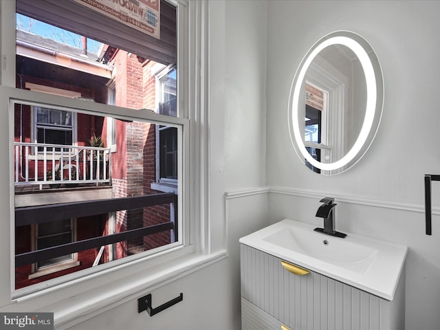 bathroom featuring sink and a healthy amount of sunlight