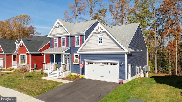 craftsman-style home with a garage and a front lawn