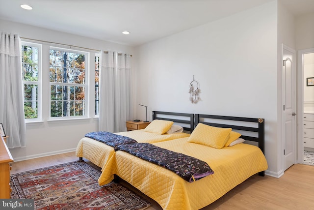 bedroom featuring hardwood / wood-style flooring