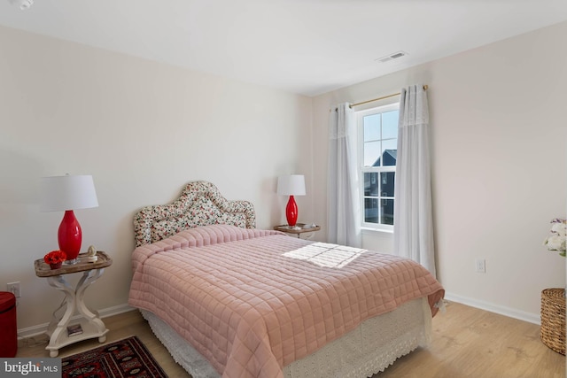 bedroom featuring light wood-type flooring