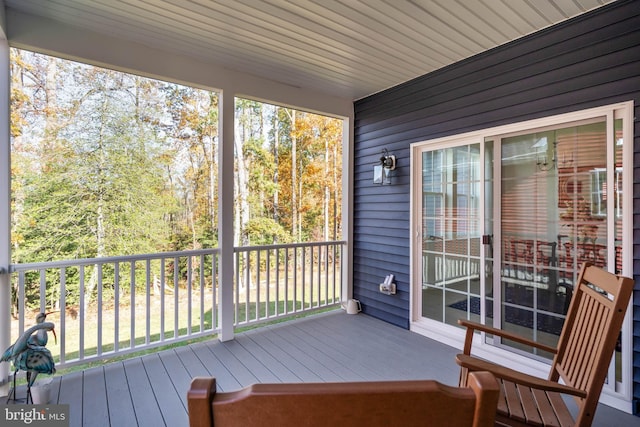 unfurnished sunroom with a wealth of natural light