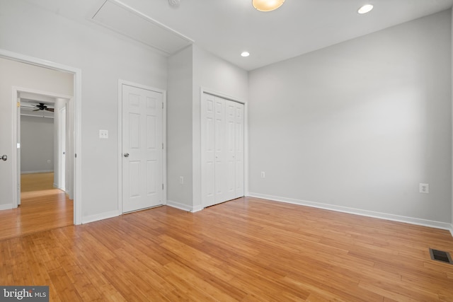 unfurnished bedroom with light hardwood / wood-style floors