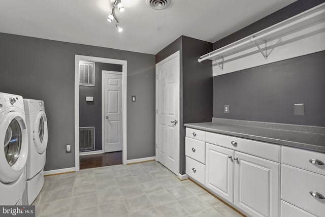 laundry room featuring independent washer and dryer