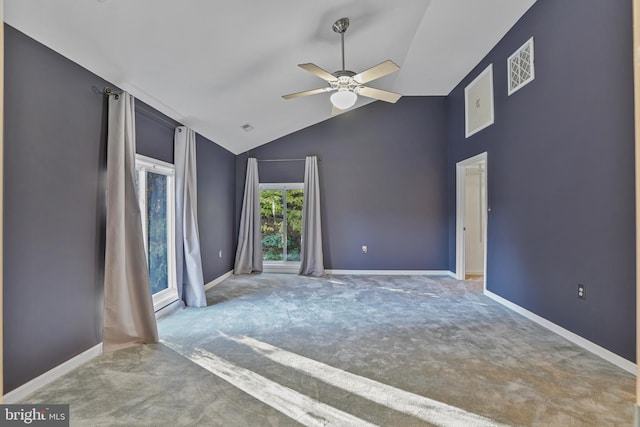 unfurnished room featuring lofted ceiling, light colored carpet, and ceiling fan