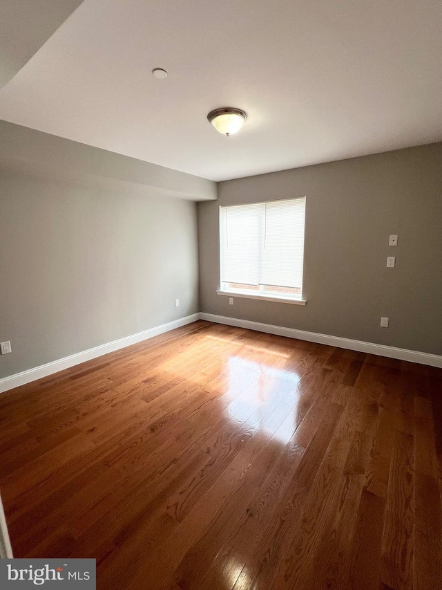 empty room featuring hardwood / wood-style floors