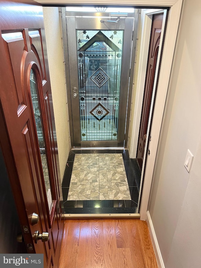 doorway featuring light wood-type flooring