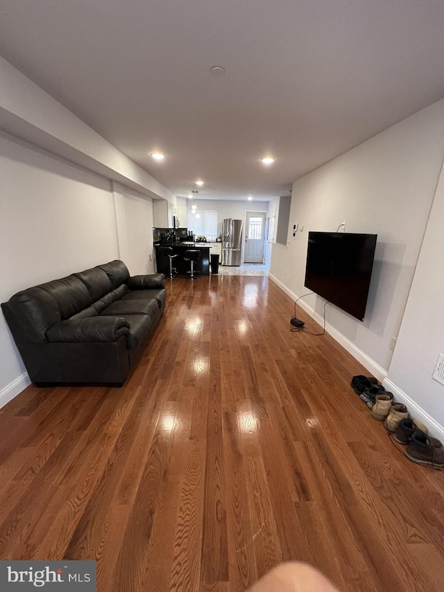 living room with hardwood / wood-style flooring