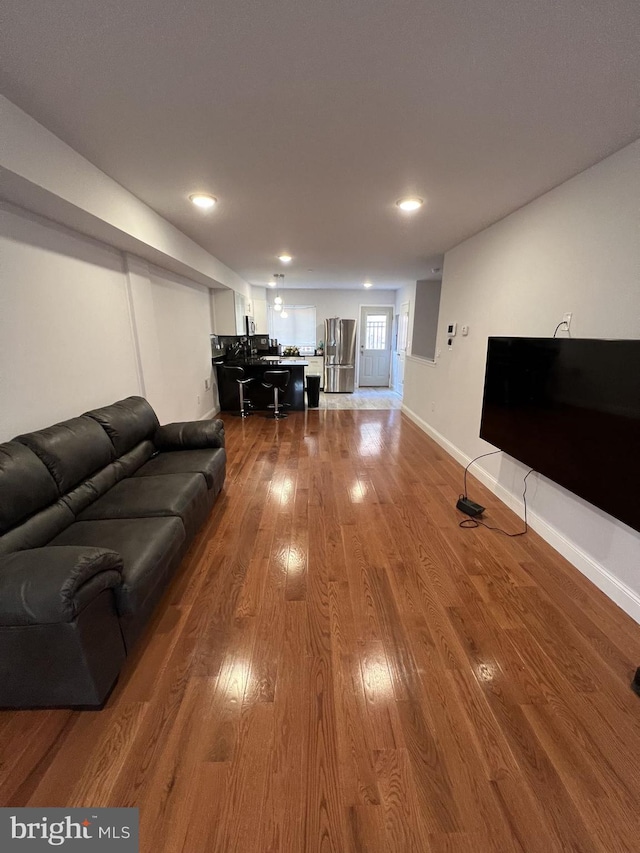 living room with hardwood / wood-style floors