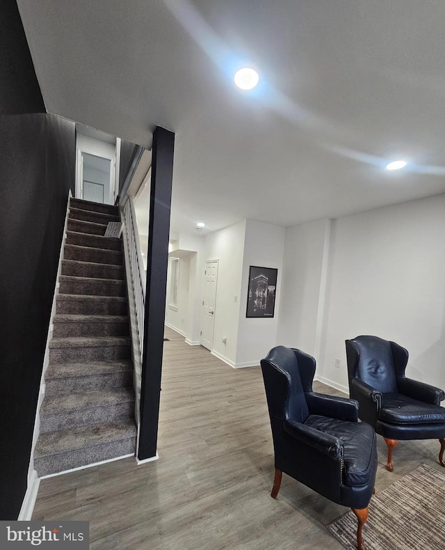 sitting room featuring hardwood / wood-style flooring