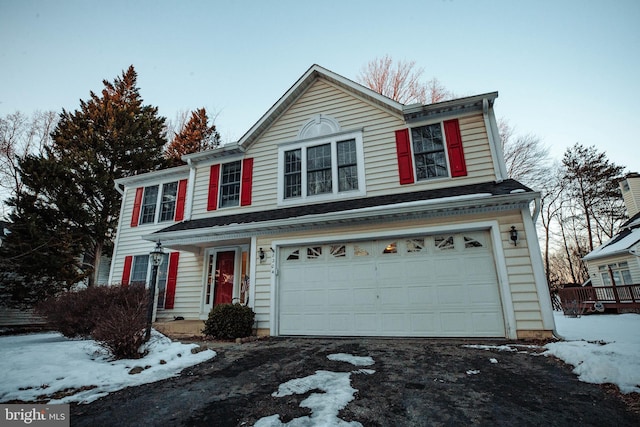 view of property featuring a garage