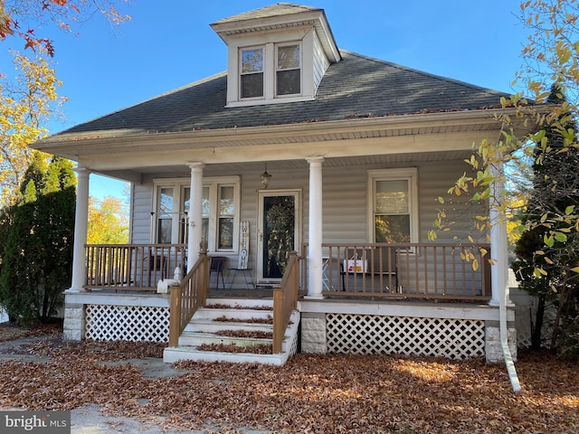 105 Pine St, Mount Holly, NJ 08060 - view of front facade with covered porch and roof with shingles