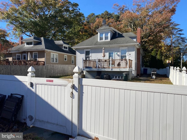 105 Pine St, Mount Holly, NJ 08060 - view of front of home featuring a fenced front yard and a gate