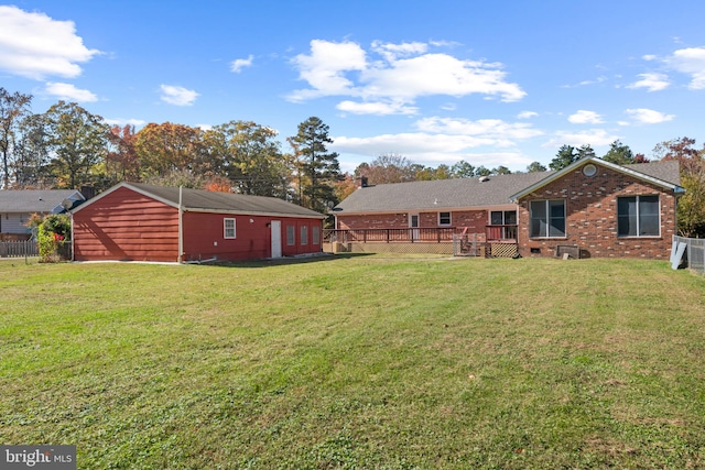 view of yard featuring a deck