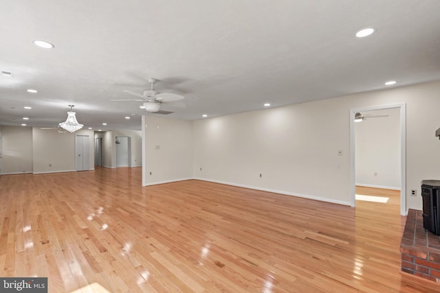 unfurnished living room with light wood-type flooring