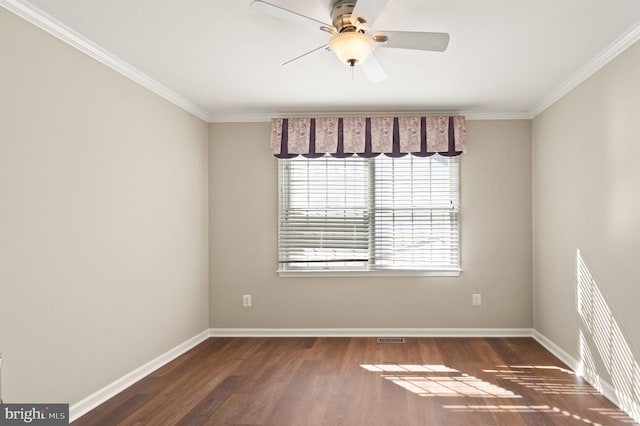 empty room with dark wood-type flooring, ceiling fan, and ornamental molding