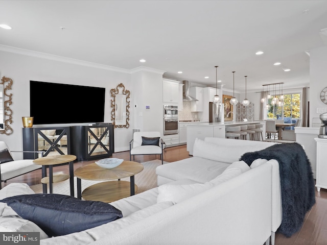 living room featuring ornamental molding and dark hardwood / wood-style flooring