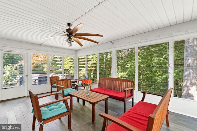 sunroom / solarium featuring a wealth of natural light and ceiling fan